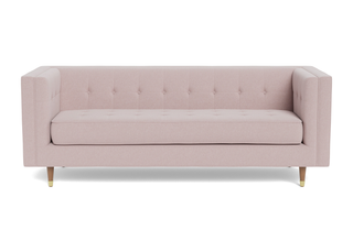 Shelter arm tight back Gramercy sofa with button tufted back and button tufted seat, cone legs and upholstered in millennial pink fabric.