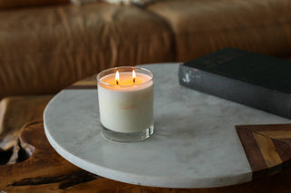 Lifestyle photo of a dilo cactus flower burning candle.