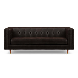 The Gramercy sofa, in brown leather, is a modern couch with a vintage feel