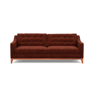 Refined traditional mid-century design is reflected in the Lawson Sofa, pictured here in red