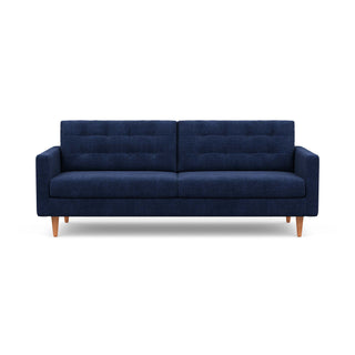 The mid-century modern Quinn Sofa in blue